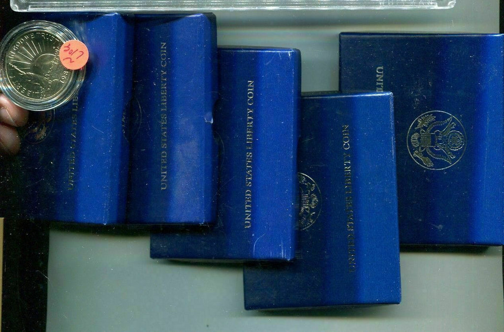 1986 STATUE OF LIBERTY HALF DOLLAR LOT OF 9 PR, 4 BU ALL IN BOX/COA 1 PR IN CAP.
